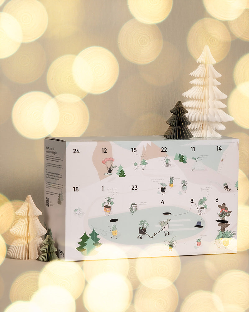 Adventskalender von feey mit Weihnachtsschmuck und Bokeh-Effekt 